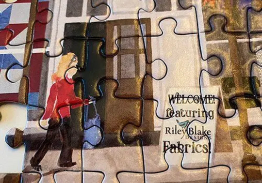 Tara Reed- Quilt Shop Village 1000PC Puzzle