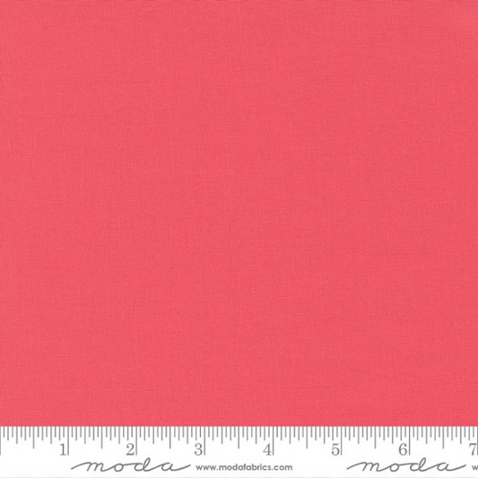 Moda BELLA Solids- Flamingo: Sold by the 1/2 yard.